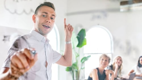 Sales person teaching sales enablement